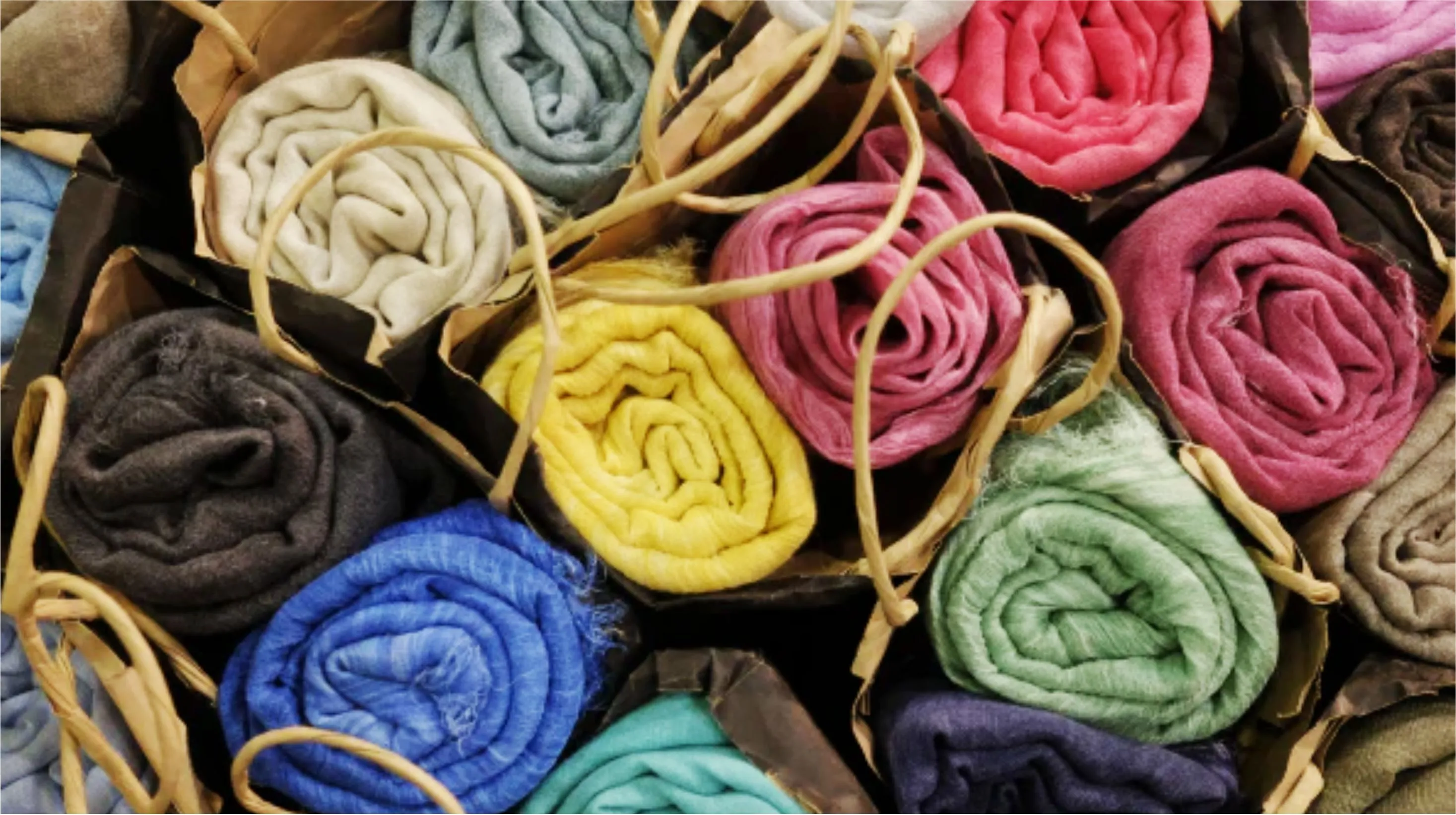 White terry bath mat beside bathtub