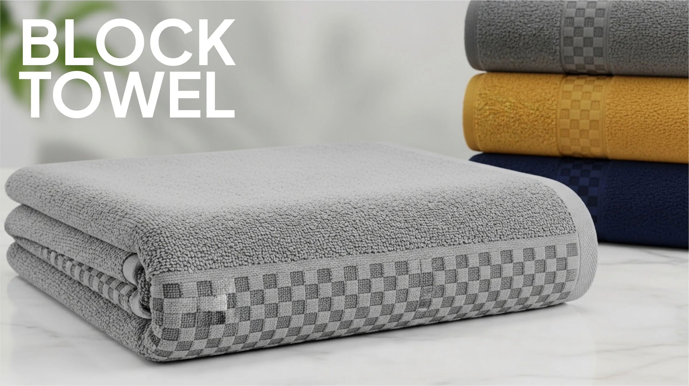 White terry bath mat beside bathtub