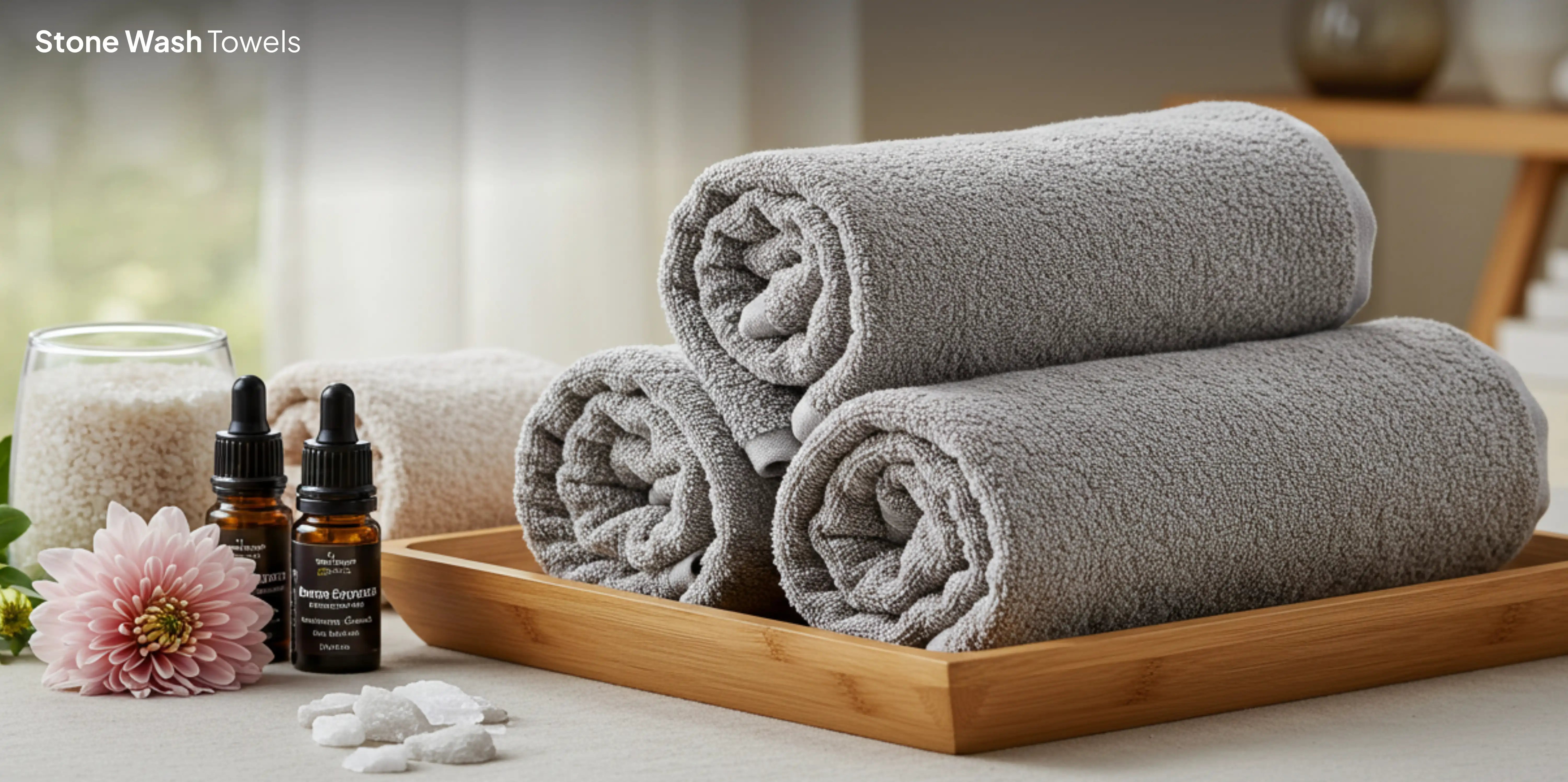Three gray towels on spa tray.