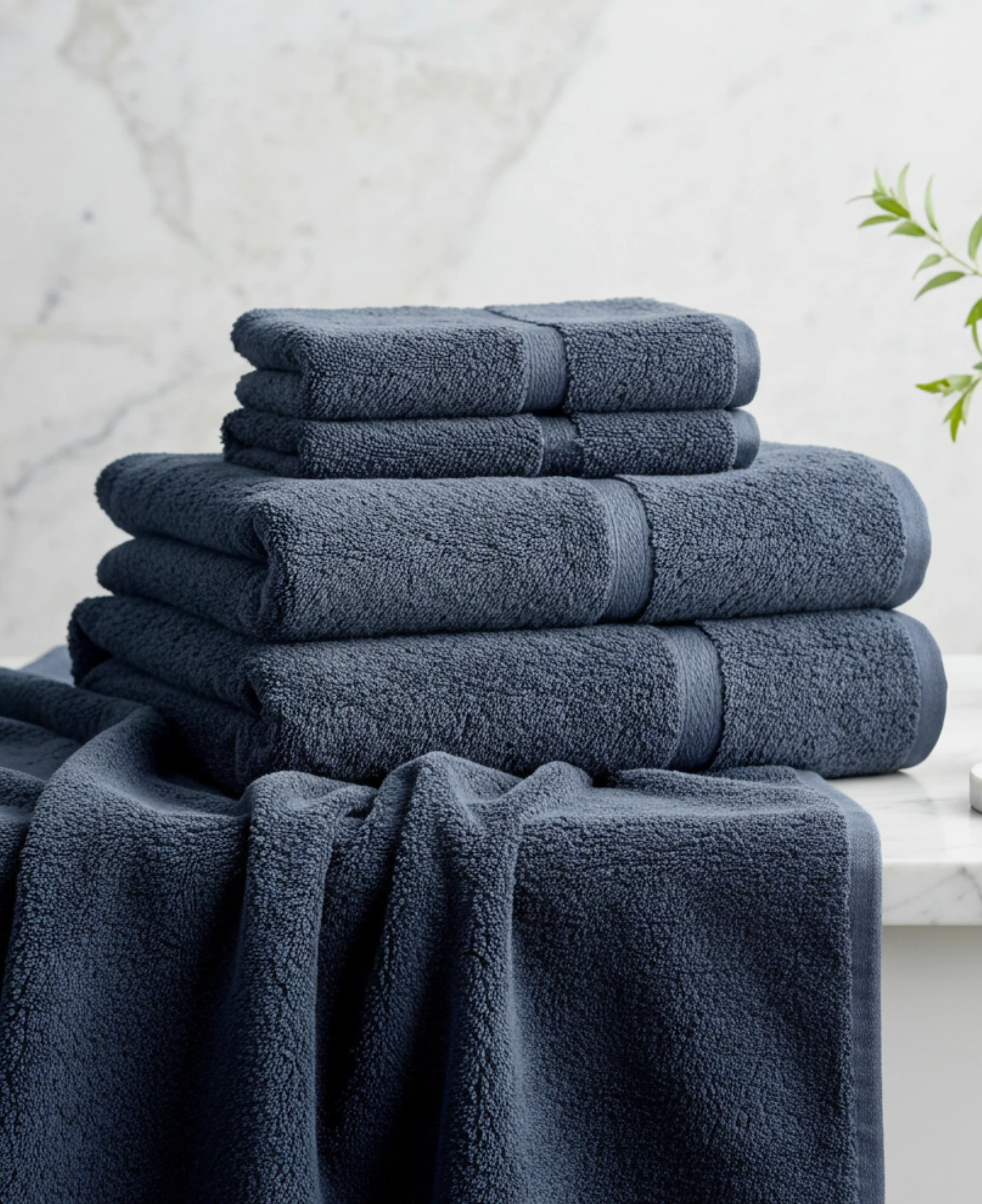 Navy towels on marble surface