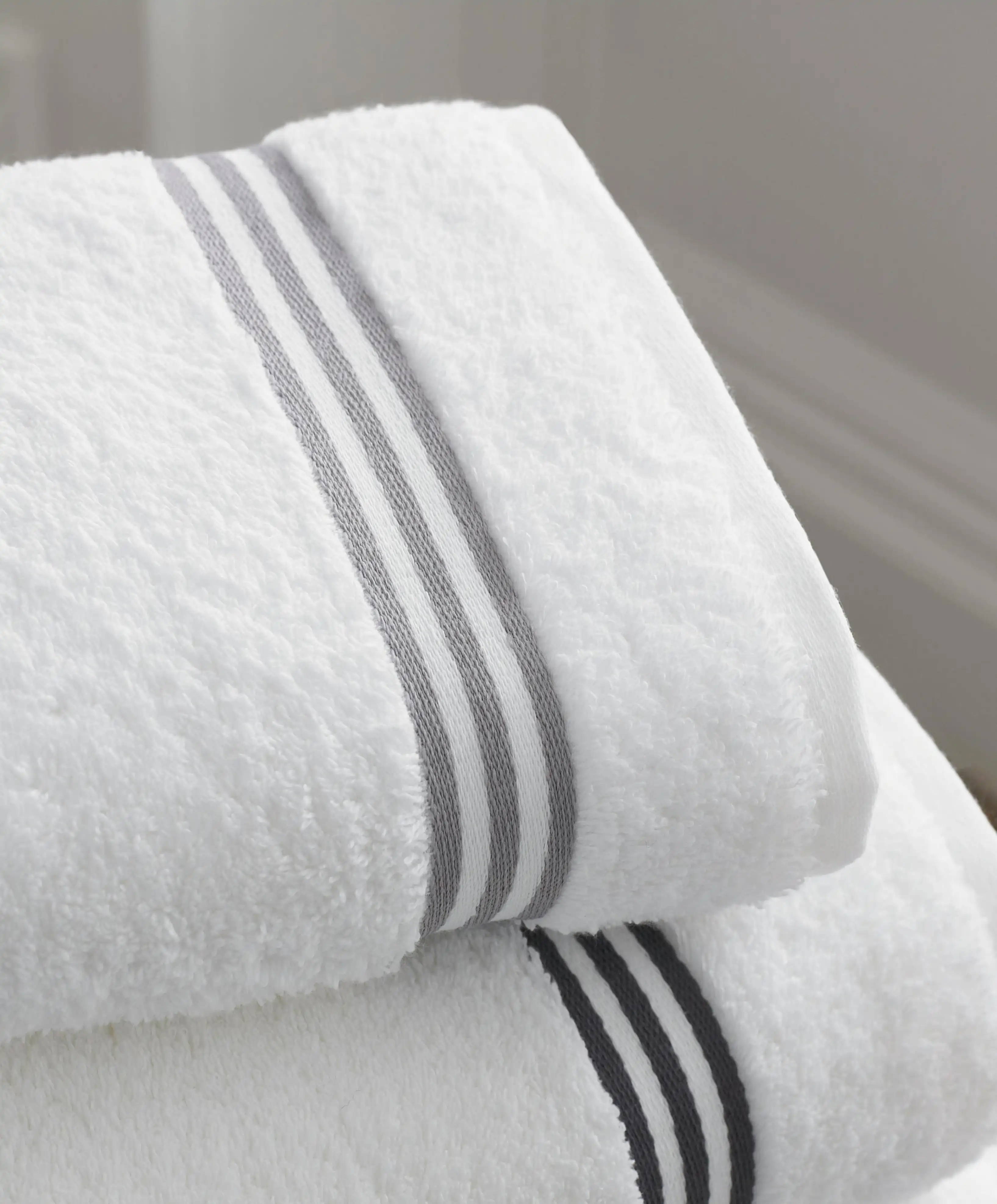 white towels with grey stripes.